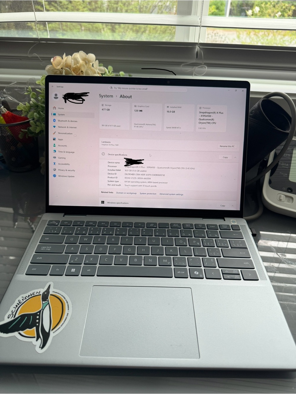 Dell Silver Laptop with Dark Gray Keyboard